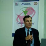 Dr. Carey lecturing at conference in Iraq